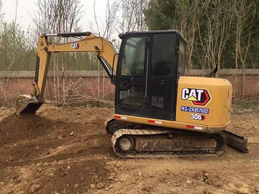 Une mini-excavatrice Cat 306 de seconde main, bien entretenue et disponible dès maintenant.